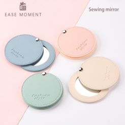 Rotating makeup mirror with rounded lines